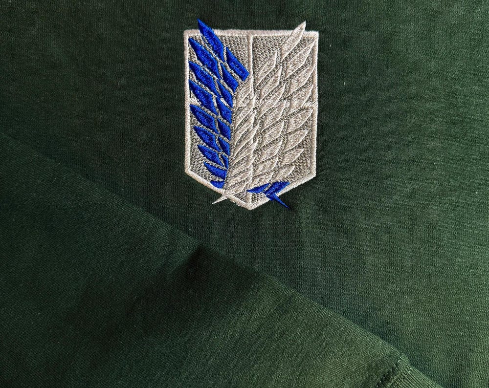 Anime Inspired Left Side Embroidered AOT Freedom Regiment Shirt.